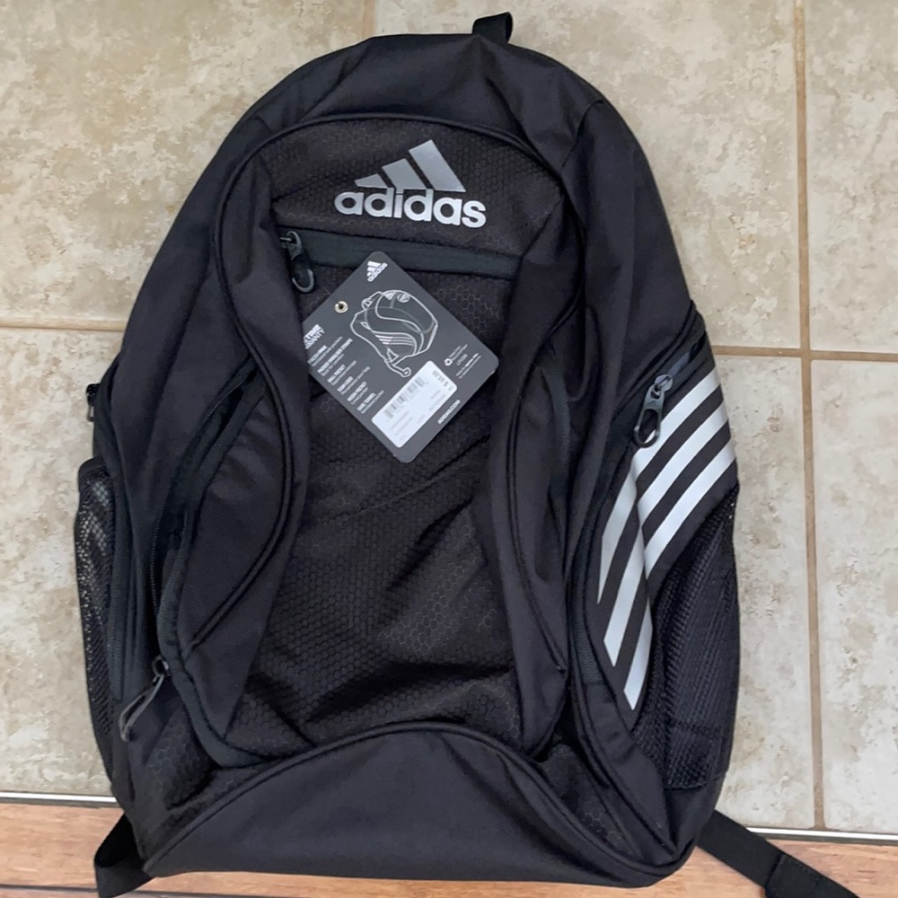 New w/tags.  Black and gray.  Lots of room